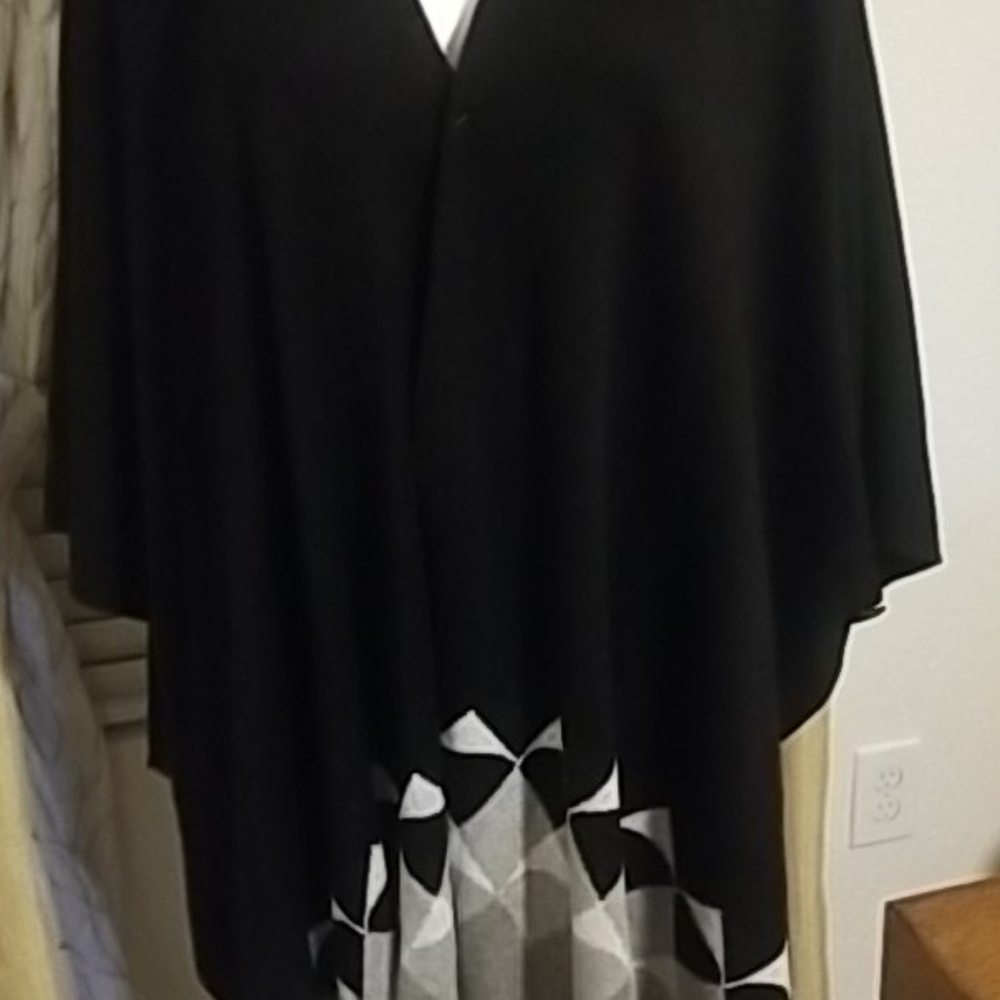 Poncho style sweater in o/s size